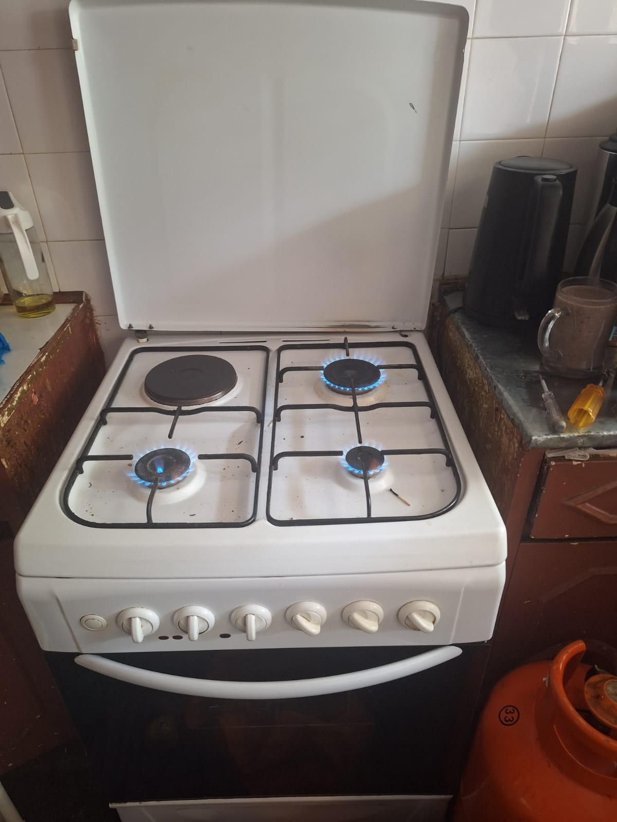 Cooker repair completed — burners running clean